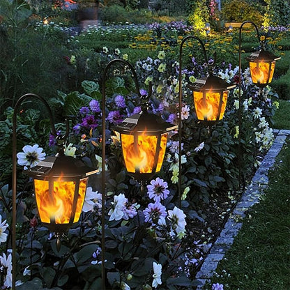Dynaming 4 Pack Solar Flame Hanging Lights Outdoor, Halloween Solar Flickering Flame LED Garden Lanterns with 4 x 38 Inch Shepherd Hooks, Christmas Lighting for Lawn Patio Yard Pathway Driveway